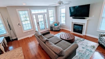 TV, fireplace, books, offices