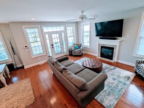 TV, fireplace, books, offices