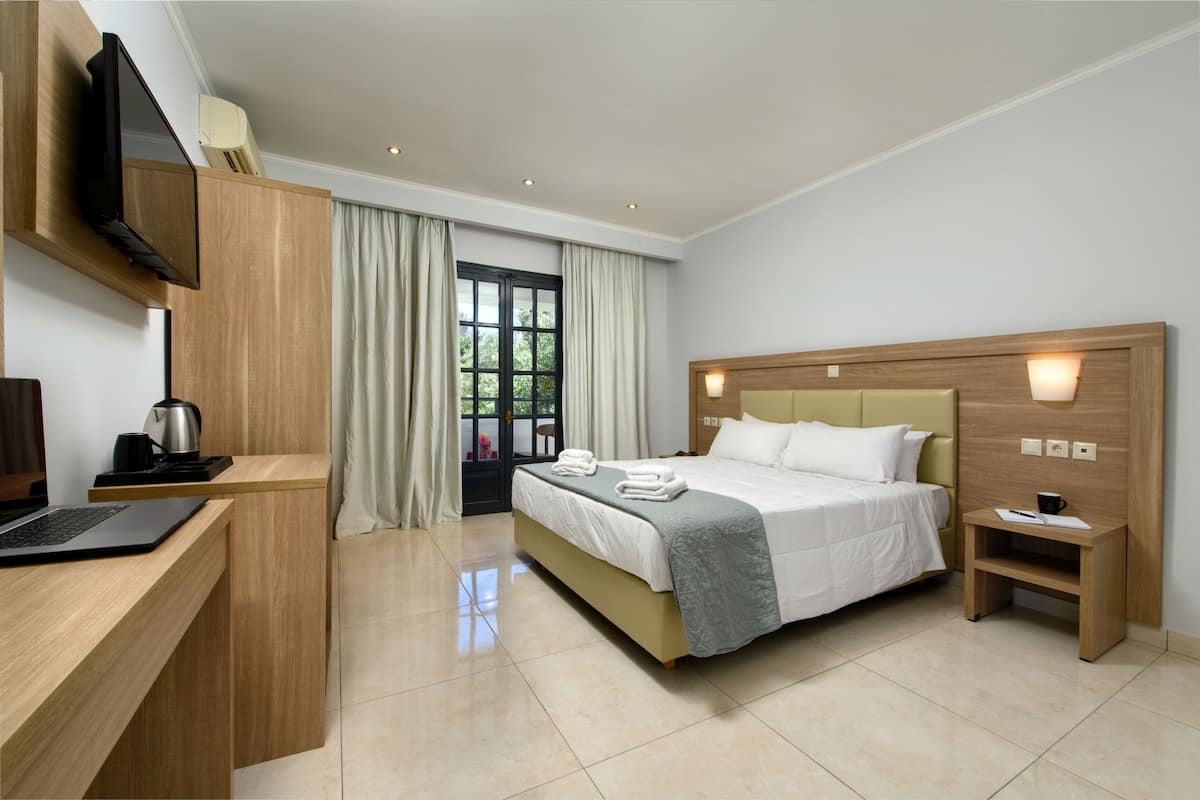 Hypo-allergenic bedding, desk, laptop workspace, blackout curtains
