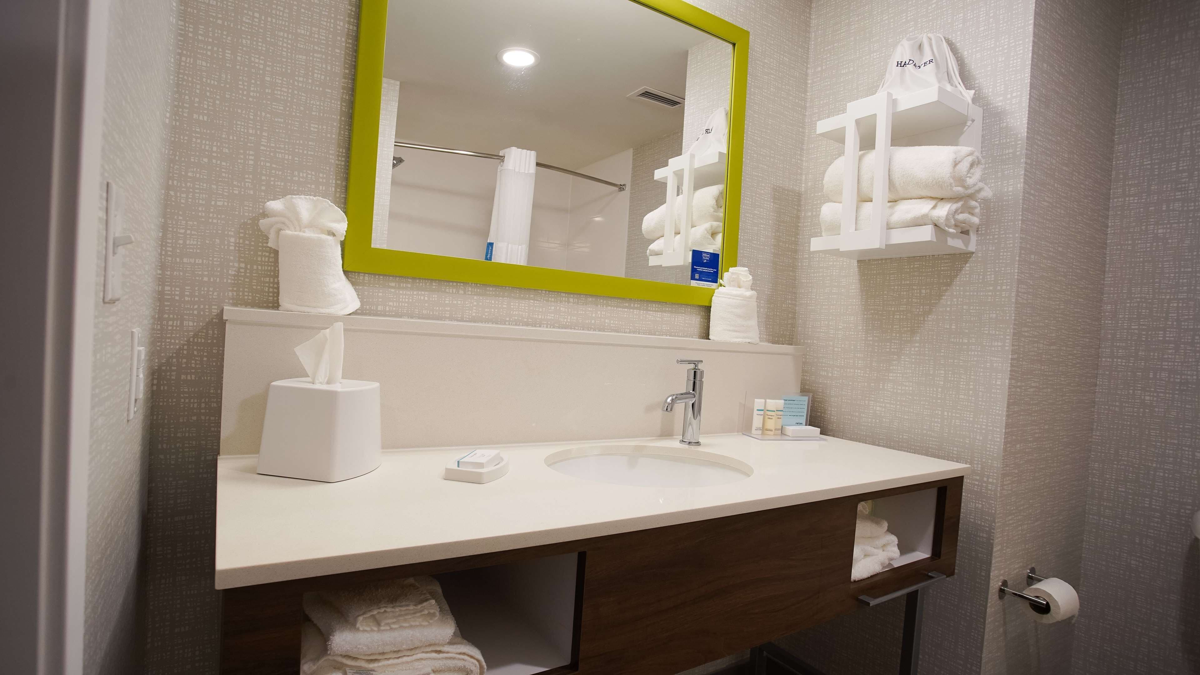 hair dryer, towels, soap, shampoo