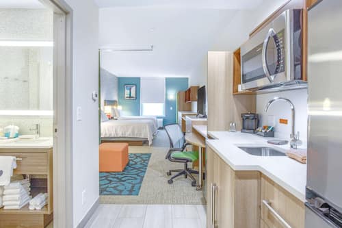 Desk, laptop workspace, free WiFi, bed sheets