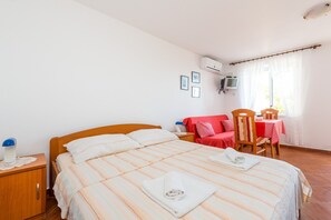 Wi-Fi de cortesia, roupa de cama