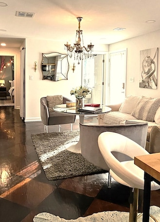 Smart TV, books. Uptown Masterpiece, Luxury Central to Everything