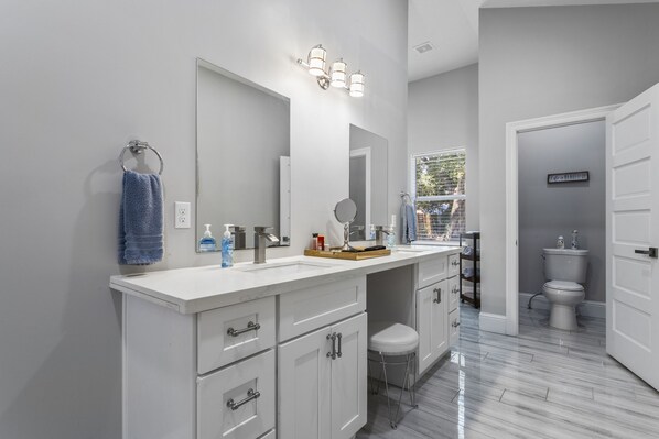 Combined shower/tub, hair dryer, towels, soap