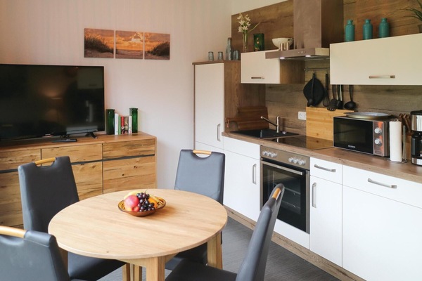 Fridge, stovetop, dishwasher, coffee/tea maker