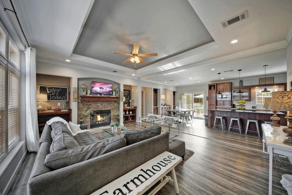 Living Room with Fireplace, Dining Room & Kitchen