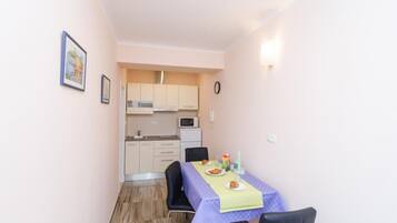 Apartment (One-Bedroom Apartment -Lara) | Living room | Flat-screen TV