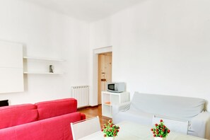 Apartment, 1 Bedroom | Living area | Flat-screen TV