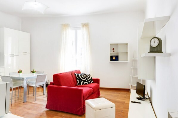 Apartment, 1 Bedroom | Living area | Flat-screen TV
