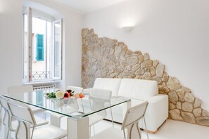 Apartment, 1 Bedroom | Living area | Flat-screen TV