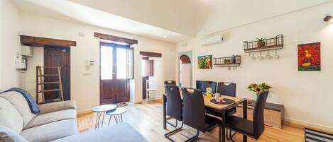 Apartment, 1 Bedroom | Living area | Flat-screen TV