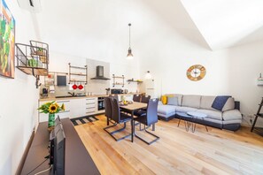 Apartment, 1 Bedroom | Living area | Flat-screen TV