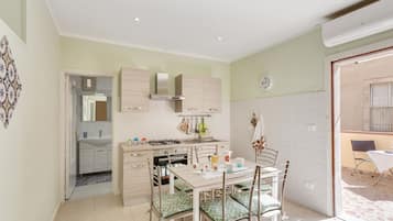 Apartment, 3 Bedrooms | Private kitchen | Full-size fridge, microwave, oven