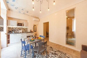 Apartment, 1 Bedroom | Living area | Flat-screen TV