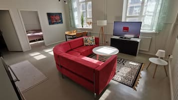Apartment | Living room | 30-inch TV with digital channels