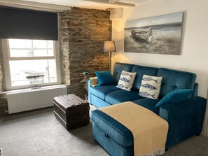 Apartment | Living area | 42-inch Smart TV with digital channels, TV, fireplace