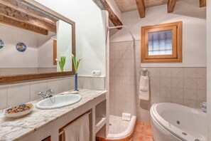 Bathtub, hair dryer, towels