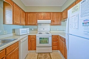 Fridge, microwave, oven, stovetop - Oak Island Beach Villa 1512 / 1000 Caswell Beach Road (Caswell Beach)