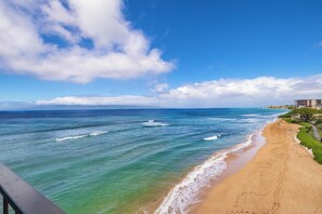 On the beach, sun-loungers