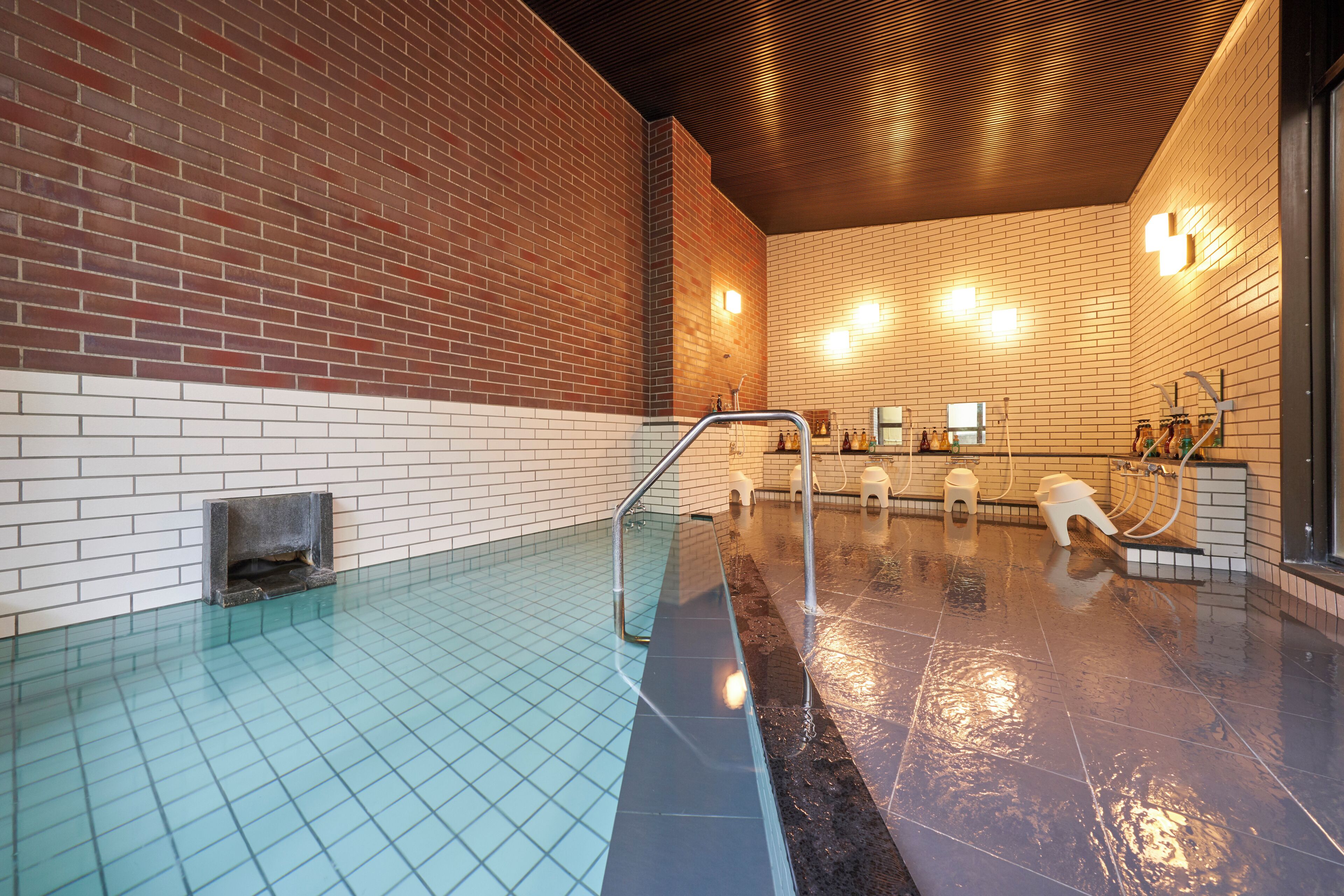 Hair dryer, slippers, towels, toilet paper