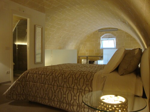 LIVING IN THE SASSI, A TUFF HOUSE IN THE SASSO BARISANO, MATERA