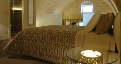 LIVING IN THE SASSI, A TUFF HOUSE IN THE SASSO BARISANO, MATERA