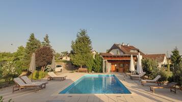 Seasonal outdoor pool, a heated pool