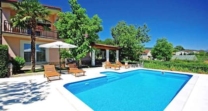 Holiday home with swimming pool and air conditioning