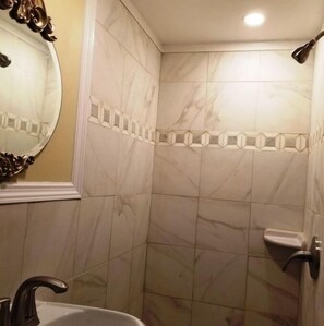 Combined shower/tub