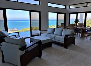 32-inch flat-screen TV with cable channels, TV - Turquoise Views at Coral Views Village (Roatan)