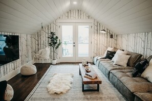 Smart TV, fireplace, table tennis, books