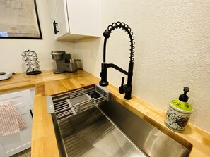 Fridge, microwave, dishwasher, coffee/tea maker