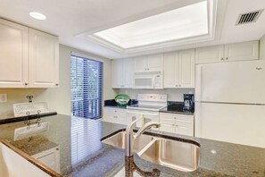 Condo (25820 Hickory Blvd #101) | Private kitchen | Fridge, microwave, dishwasher, coffee/tea maker - 25820 Hickory Blvd #101 (Bonita Springs)