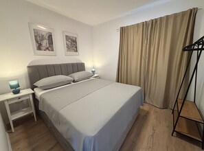 2 quartos, acesso à internet, roupa de cama