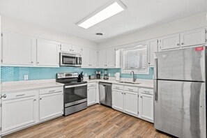 Fridge, microwave, oven, stovetop - Tipsy Turtle-Pet, 4BR Luxury Channel House-Pool (North Myrtle Beach)