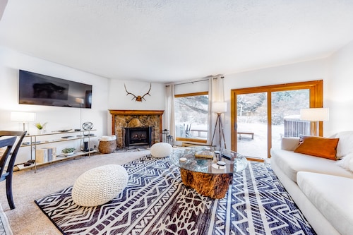 Open and inviting, two-story condo with full kitchen, patio, and wildlife views