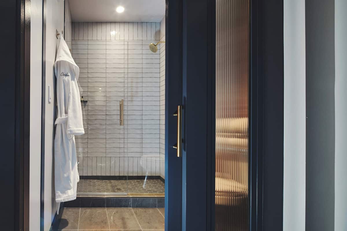 Rainfall showerhead, designer toiletries, hair dryer, bathrobes