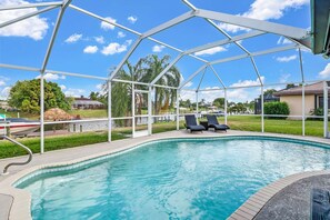 House (1201 SE 32nd Ter) | Pool | A heated pool, pool loungers