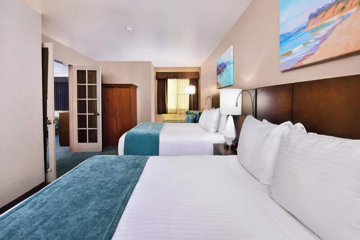 family suite, 2 queens & kitchenette | desk, blackout curtains, iron/ironing board, cots/infant beds