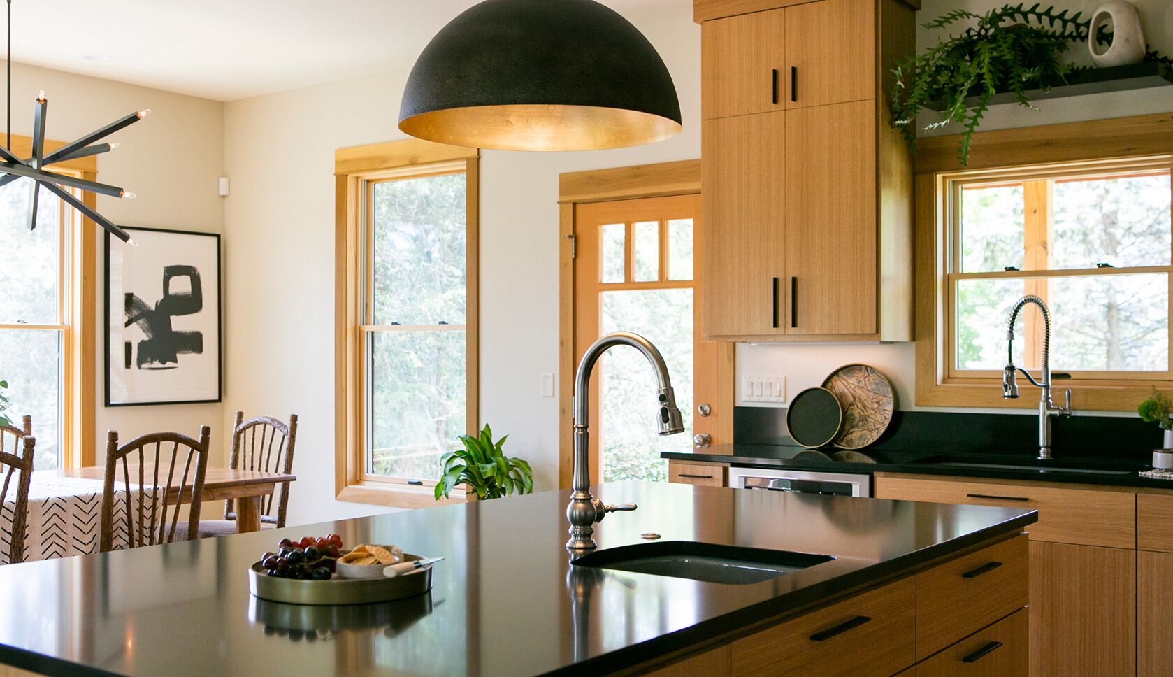 Kitchen prep island with lake view and small sink.
