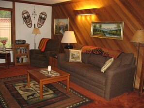 Living Room - Living room queen sleeper sofa ( lazy boy airbed)Flat screen TV and wood burning rock fireplace.