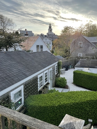 Property grounds. Cozy upper studio- fully equipped & close to town, harbor, shops & restaurants!