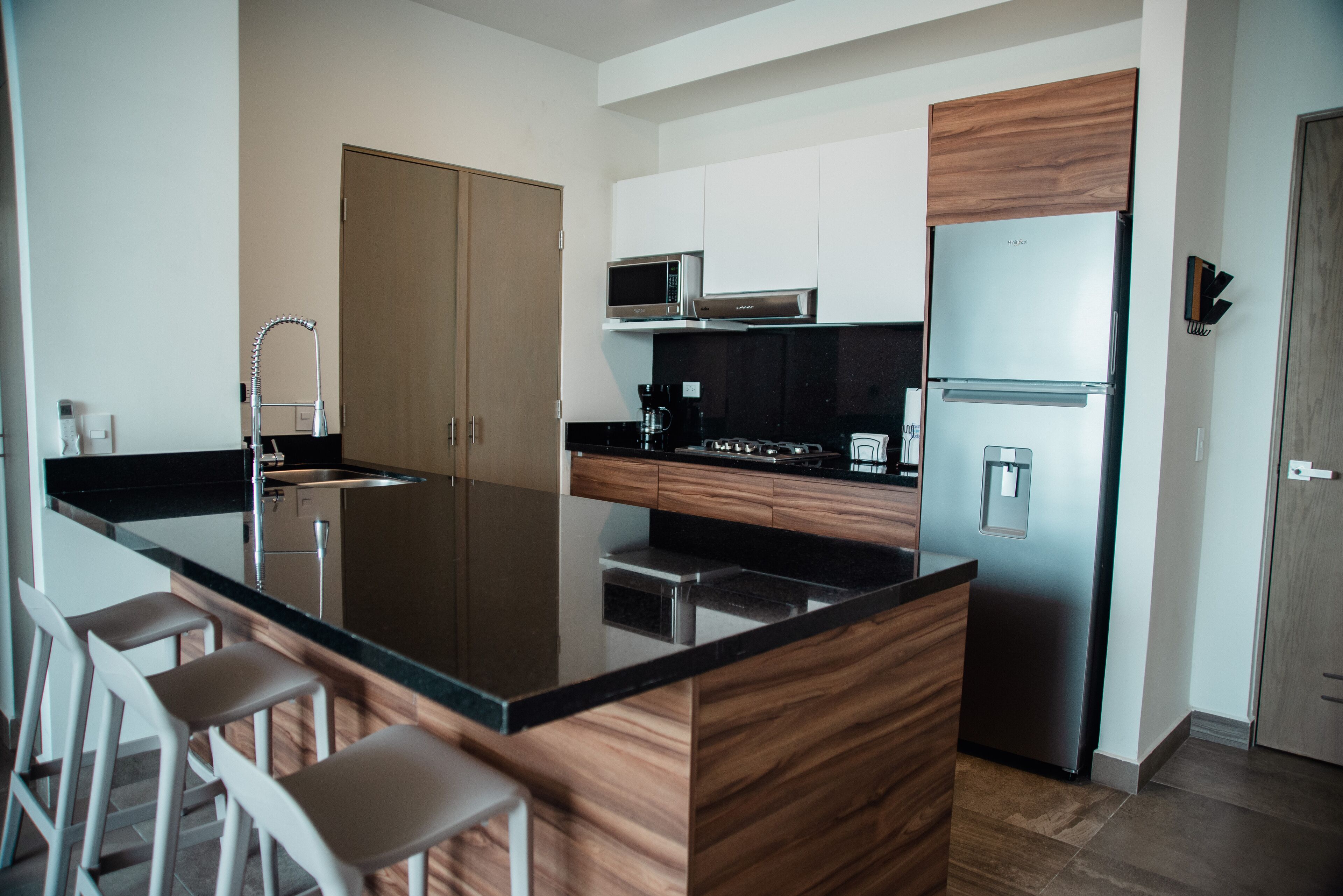 Coffee/tea maker, fridge, microwave, oven