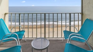 A balcony with a view of the beach and ocean. - Come Stay at This Beautiful Unit From HGTV's - Island Life! (Ocean City)