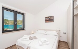 4 室のベッドルーム、旅行用ベビーベッド、WiFi (無料)、ベッドシーツ