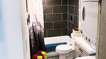 Combined shower/tub, hair dryer, towels, soap