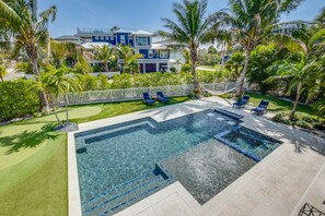 A heated pool - Golf Cart - Coconut Cove by SeaBreeze Vacation (Anna Maria)