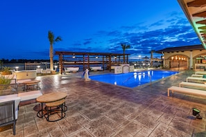 Outdoor pool, open 9:00 AM to 10:00 PM, free cabanas, pool umbrellas