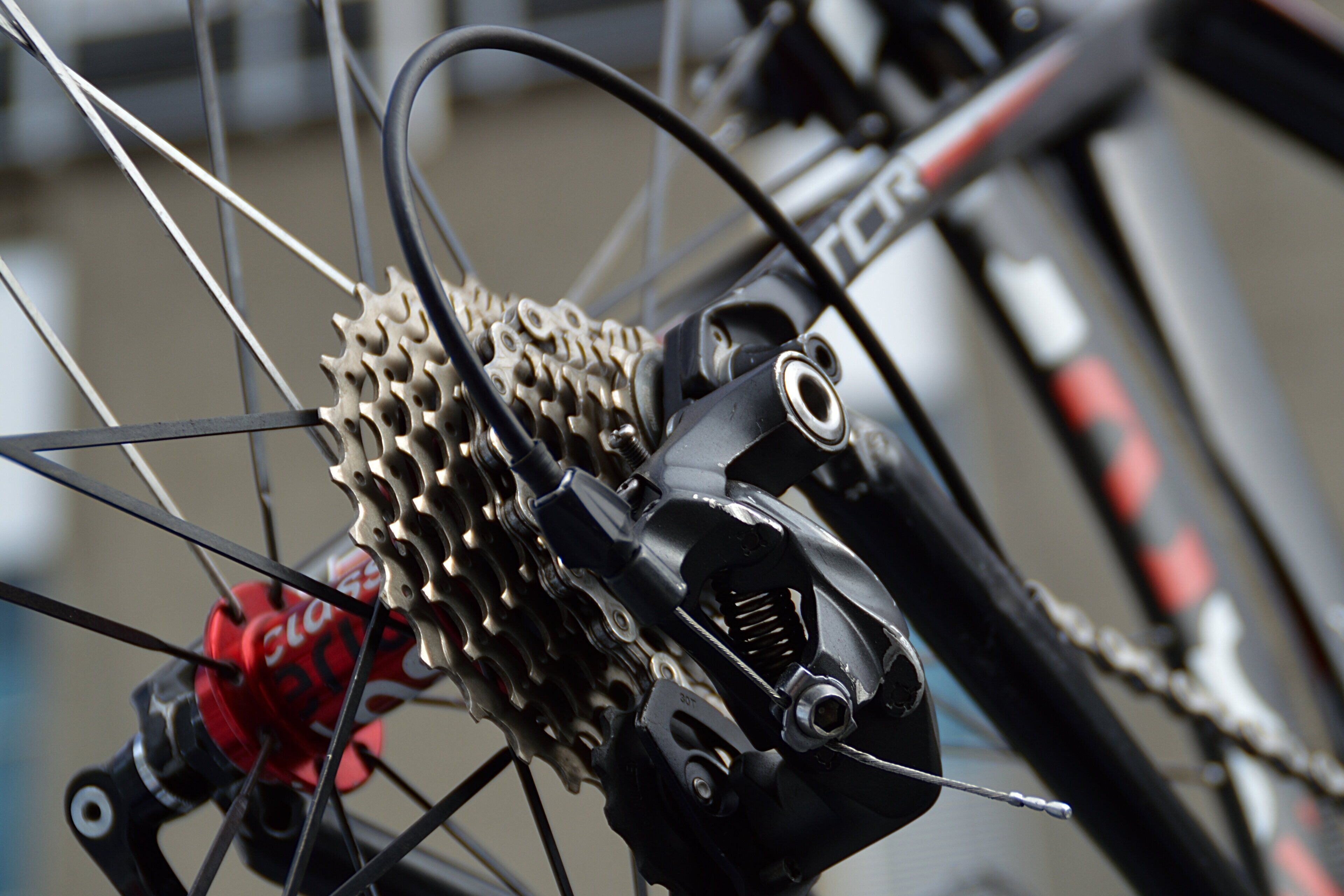 A close-up of a bicycle's rear derailleur and cassette.
