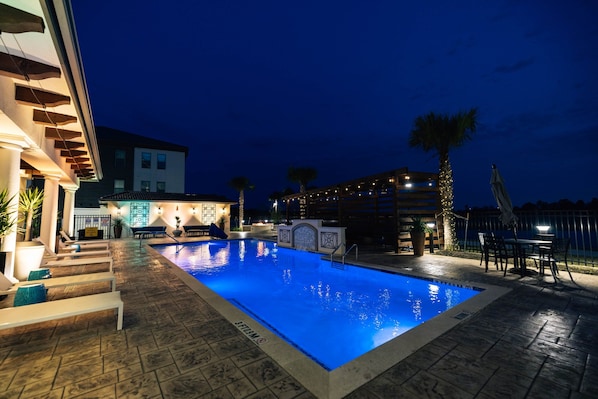 Outdoor pool, open 9:00 AM to 10:00 PM, free pool cabanas